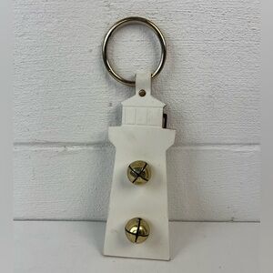 Lighthouse shaped leather doorbell hanger